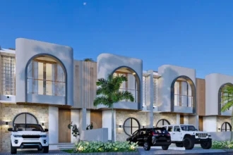 Desain modern tropis Ambengan Villa Cluster Bali dengan fasad mewah, sistem satu gate, dan area parkir luas untuk dua mobil di kawasan Pedungan Denpasar.