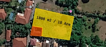 Aerial view map showing a yellow-outlined 1800 m2 (18 Are) plot with an orange building footprint in the bottom-left; surrounding houses and trees nearby in Bali area.