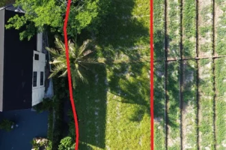 Lahan investasi properti Bali dengan pemandangan sawah alami dan sungai di Pejeng Kawan Ubud.